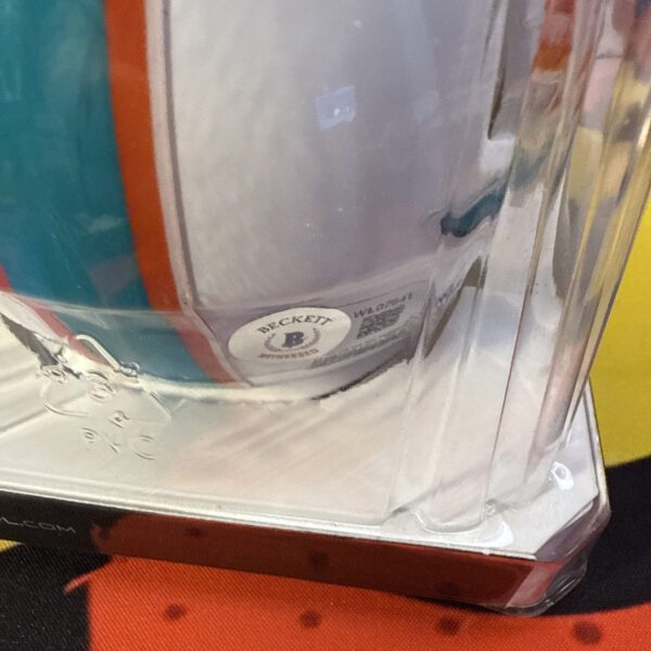 A close up of the bottom of a plastic container.