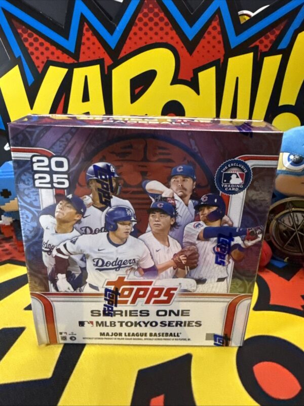 A box of topps baseball cards on top of a table.