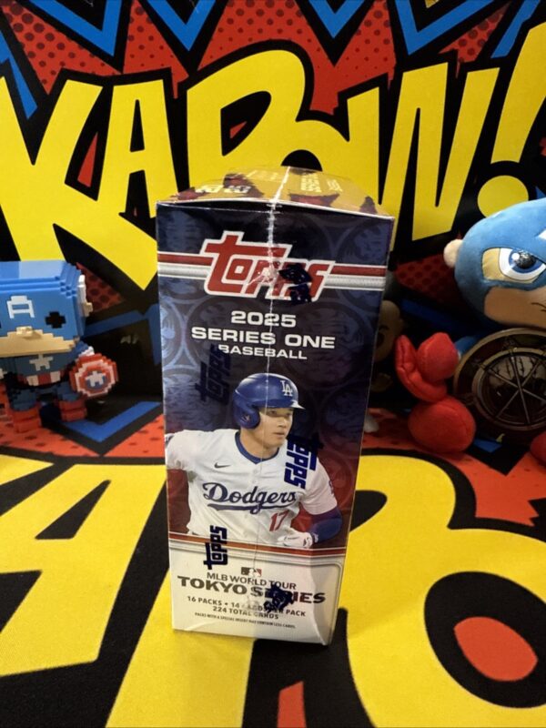 A baseball card sitting on top of a table.