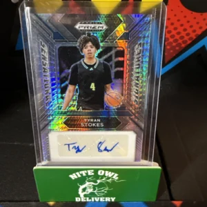 Basketball card with autograph in protective case.