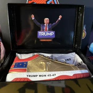 Gold sneaker with "Trump Won" text displayed.